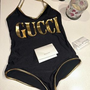 Gucci one piece black and gold bathing suit 100% Authentic